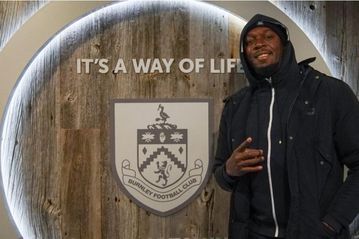Why Usain Bolt took a picture infront of Burnley's logo despite being a Manchester United fan