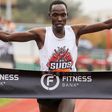 Edwin Kurgat crosses the finish line to win a past race.