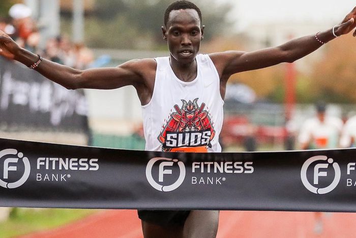 Edwin Kurgat crosses the finish line to win a past race.