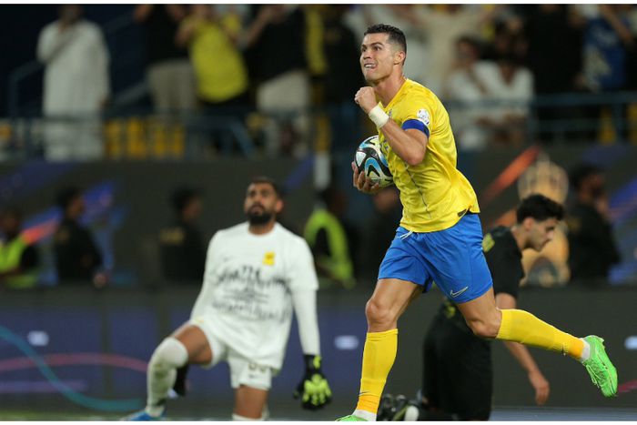 Al Nassr history maker Cristiano Ronaldo celebrates one of his goals against Al Ittihad.