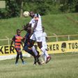 Tusker FC captain Humphrey Mieno heads the ball against  Vihiga Bullets.