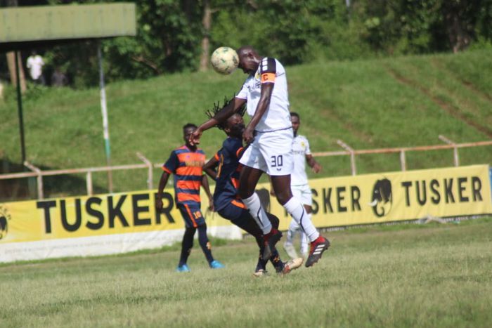 Tusker FC captain Humphrey Mieno heads the ball against  Vihiga Bullets.