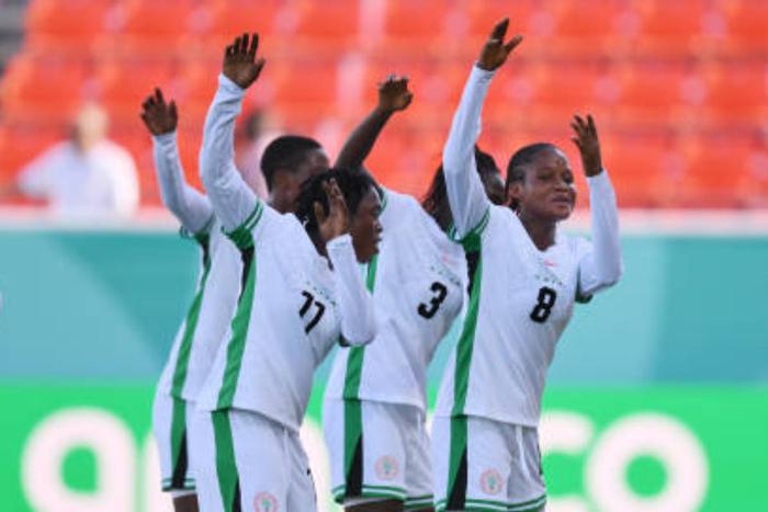 Faridat Abdulwahab celebraates a goal with her Falconets teammates.