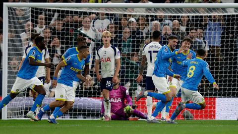 Santiago Bueno celebrates the opener with his Wolves teammates. (Photo Credit: Premier League)