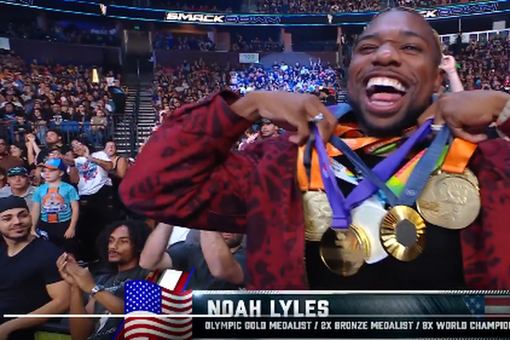 Noah Lyles makes celebrity appearance, shows off his iconic medal collections at WWE SmackDown