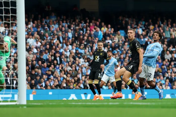 Own goal rescues Guardiola as Man City escape Burnley scare