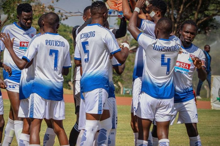 Posta Rangers FC players celebrate a gaol.