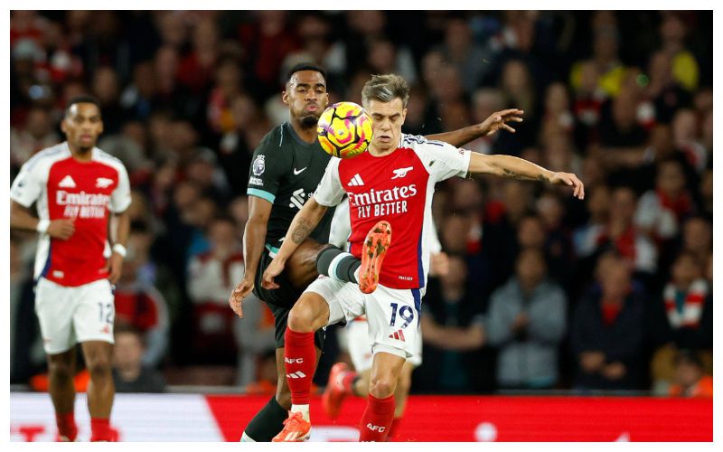 Injurystricken Arsenal suffer late goal in Liverpool draw as they go