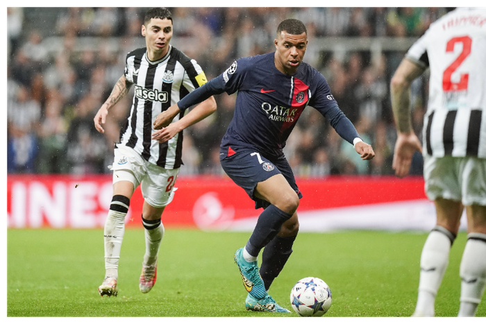 Kylian Mbappe and Miguel Almiron during the first leg between Newcastle United and PSG in the 2023-24 Champions League group stage.