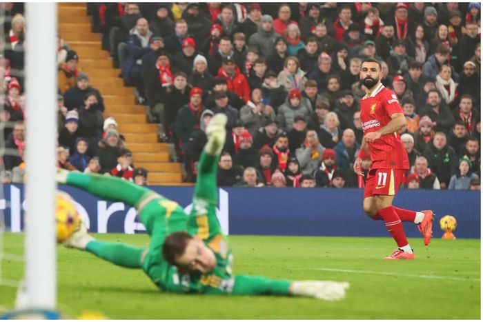 Mohamed Salah scores the history goal for Liverpool.