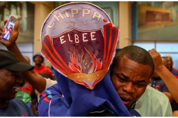 Stanley Nwabali in a warm embrace with fans after he returned to Chippa United.