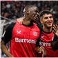 Victor Boniface (right) celebrates with his teammates.