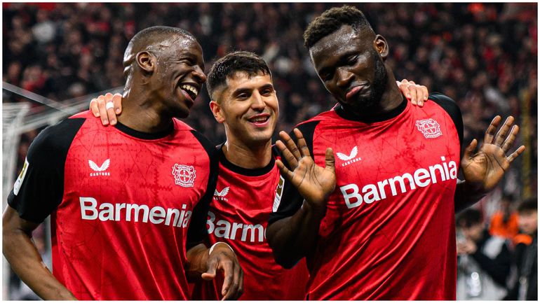 Victor Boniface (right) celebrates with his teammates.