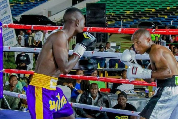 The late Najim Mohammed (right) fighting Laurent Segu on Sunday at Jamhuri Stadium in Dodoma.