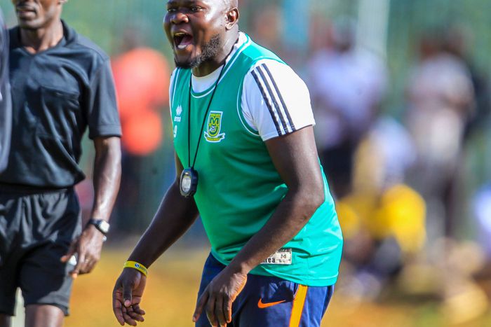 Mathare United head coach Samuel Koko barking instructions on the touchline.