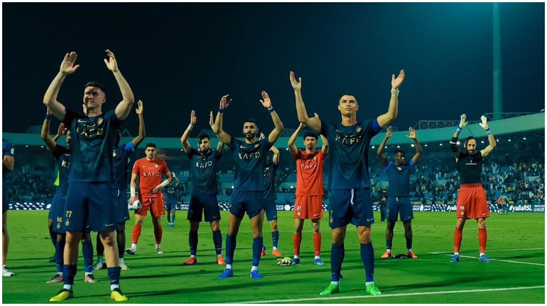 Cristiano Ronaldo and Al Nassr celebrate the narrow win on the road.