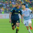 Yanga in action against USM Alger.