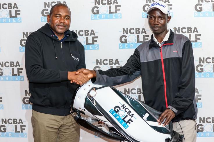 David Matano (R) receives his gift