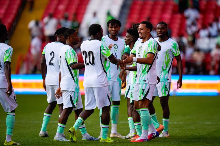 Nigerian players celebratin || imago