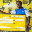 Tusker Brand Manager Lennox Mwalea presents the sponsorship to Kisumu RFC Vice Chairman Gabriel Ouma