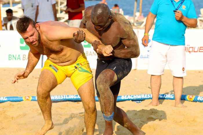 Mark Omumasaba in action against South Africa’s Machiel Johannes Grobler