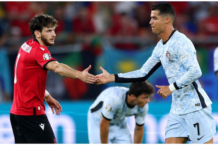Khvicha Kvaratskhelia and his idol Cristiano Ronaldo after their EURO 2024 clash.