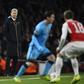 Photo by Javier Garcia BPI Shutterstock (5592183y) Arsenal manager Arsene Wenger looks towards Lionel Messi of FC Barcelona, Barca during the UEFA Champions League Round of 16 1st Leg match between Arsenal and FC Barcelona