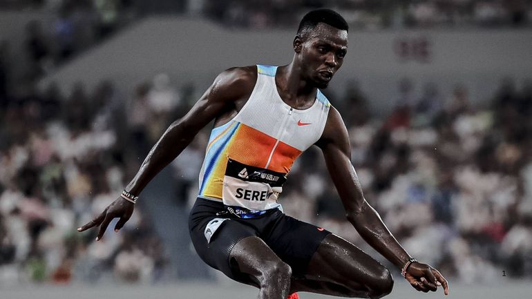 Edmund Serem clears a barrier during the steeplechase.