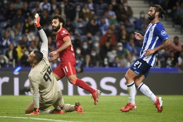 Salah, Firmino shine as Liverpool honour Hunt with Porto rout
