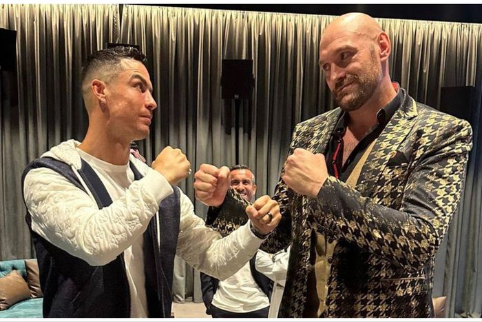 Tyson Fury made it clear what he thought of the long-running controversy surrounding Cristiano Ronaldo and Lionel Messi as the GOAT - X/TNT Sports