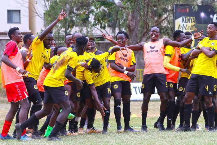 Tusker FC players celebrate a goal.
