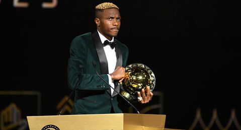 Osimhen brushes off Instagram scandal, takes CAF POTY award to alma mater Olusosun Primary School