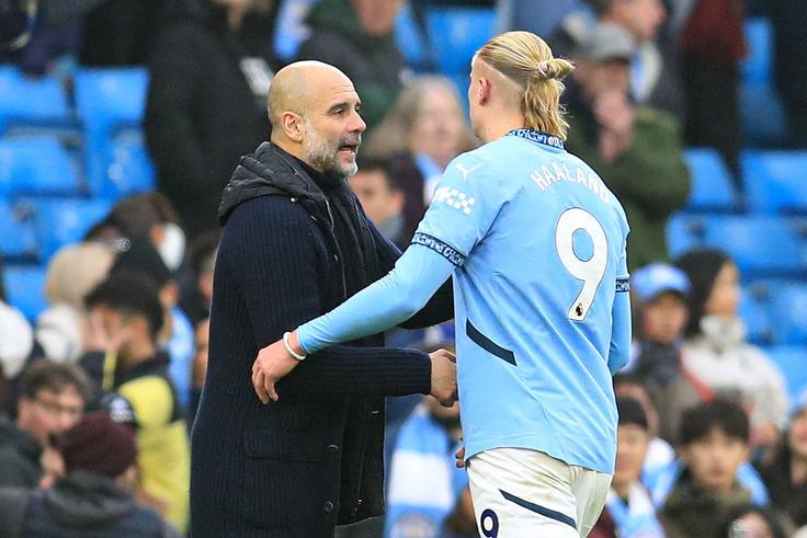 Pep Guardiola and Erling Haaland