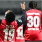Nathan Tella celebrates his first Champions League goal for Bayer Leverkusen.