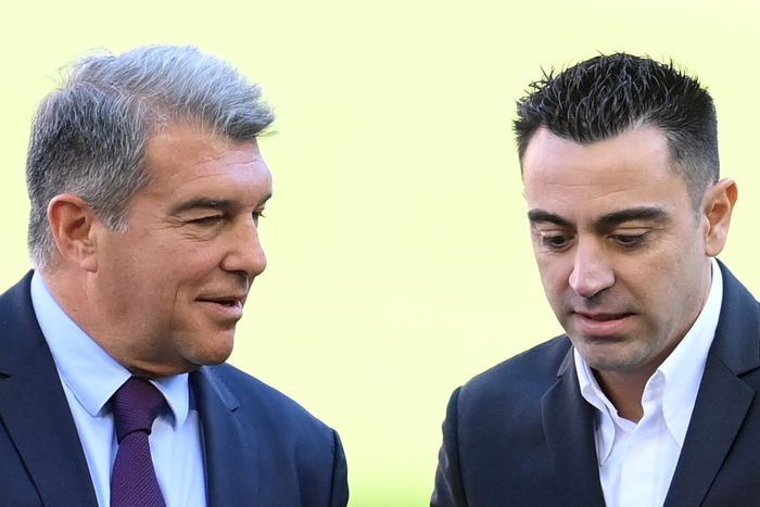 Xavi Hernandez and Joan Laporta