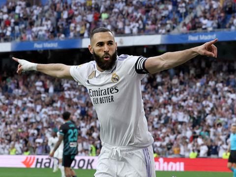 Benzema's hat-trick fires Real Madrid past Almeria to keep pressure on Barcelona