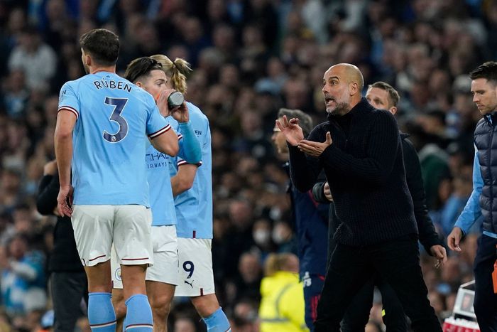 Pep Guardiola of Manchester City gives out instruction.