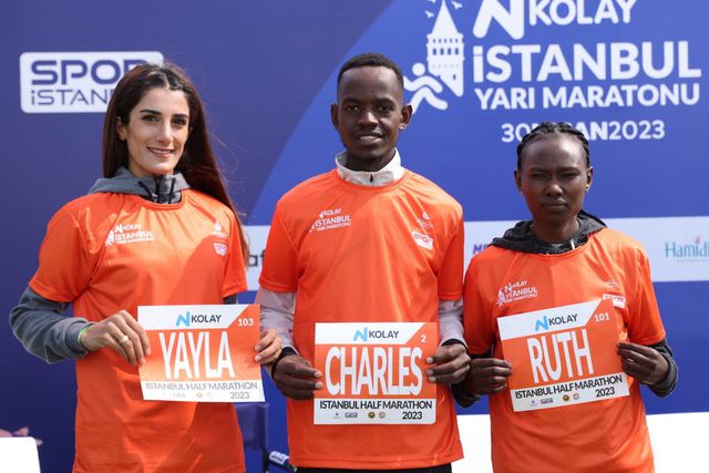 Yayla (L), Charles Langat (C) ad Ruth Chepng'etich (R)