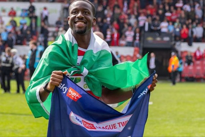 See how Ibadan striker Joseph Olowu celebrated Doncaster Rovers getting promotion to League One with a Nigerian flag.