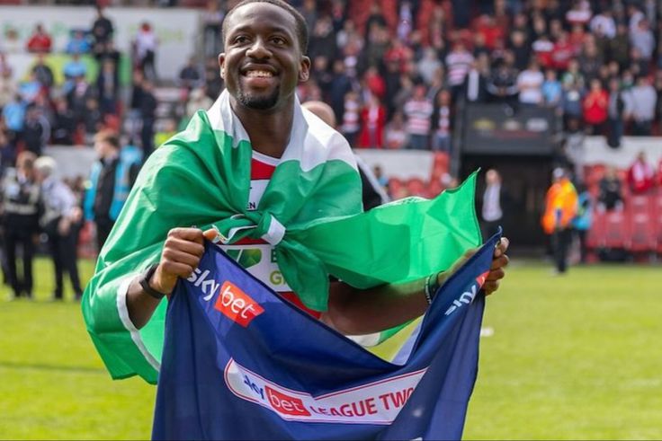 See how Ibadan striker Joseph Olowu celebrated Doncaster Rovers getting promotion to League One with a Nigerian flag.