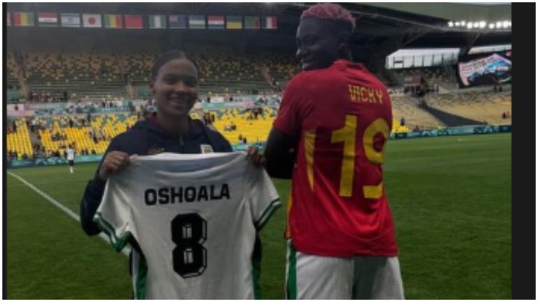 Vicky Lopez holds up Asisat Oshoala's kit after the Paris 2024 Nigeria vs Spain clash.