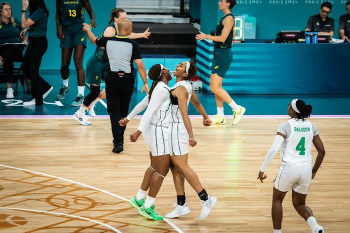 Nigeria's D'Tigress stun Australia 75-62 in the opener for their first win since 2000.