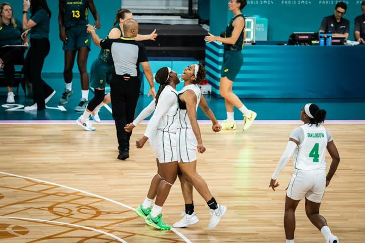 Nigeria's D'Tigress stun Australia 75-62 in the opener for their first win since 2000.