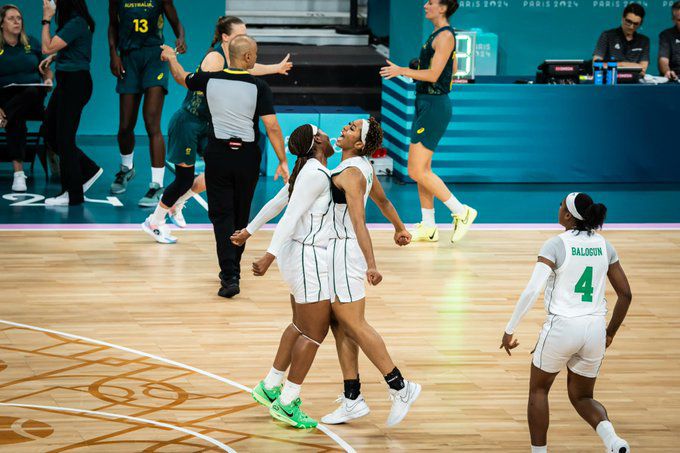 Nigeria's D'Tigress stun Australia 75-62 in the opener for their first win since 2000.