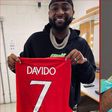Davido presented with Manchester United shirt || Instagram