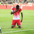 Harambee Stars striker and captain Michael Olunga in action against Iran.