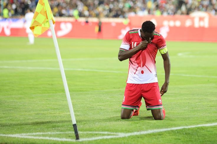 Harambee Stars striker and captain Michael Olunga in action against Iran.