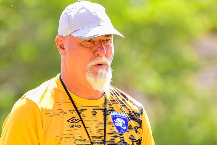 AFC Leopards head coach Patrick Aussems watches as players train.