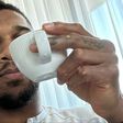 Nigerian-born Anthony Joshua shows off coffee ahead of his boxing return.