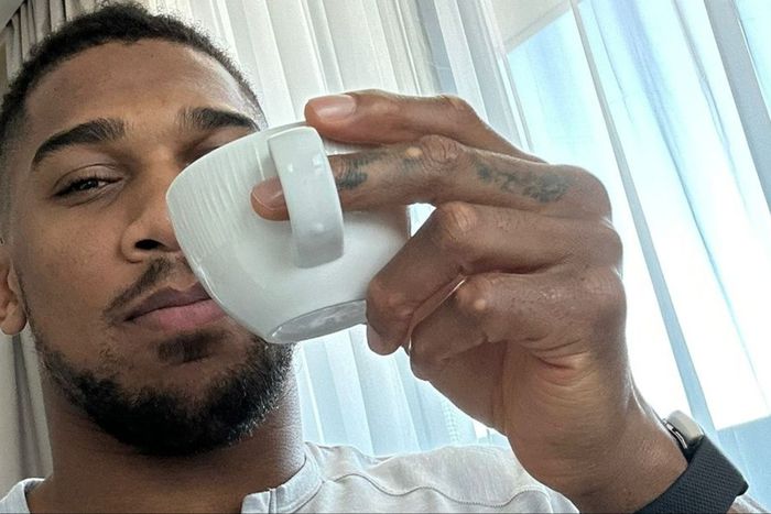 Nigerian-born Anthony Joshua shows off coffee ahead of his boxing return.
